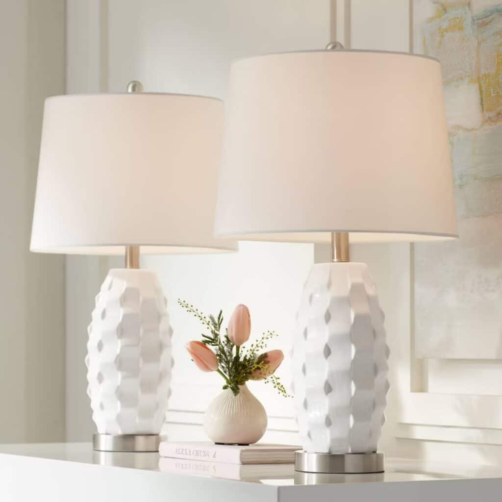 Set of two white modern coastal lamps sitting on a console from our Target home finds guide.