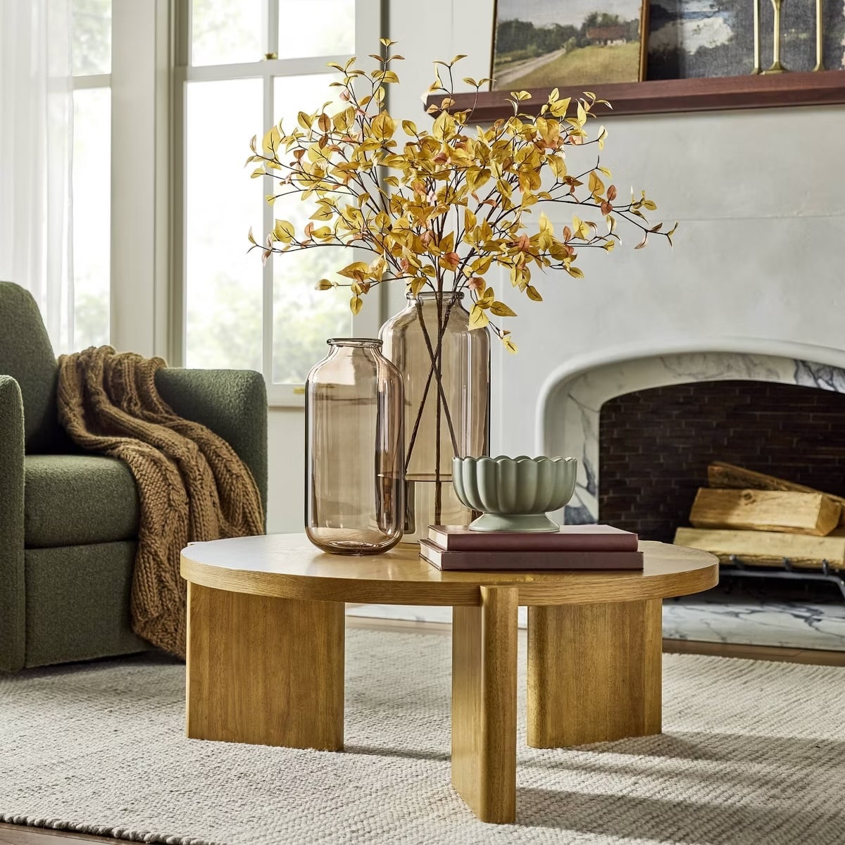 Glass vases from Target sitting atop a coffee table.