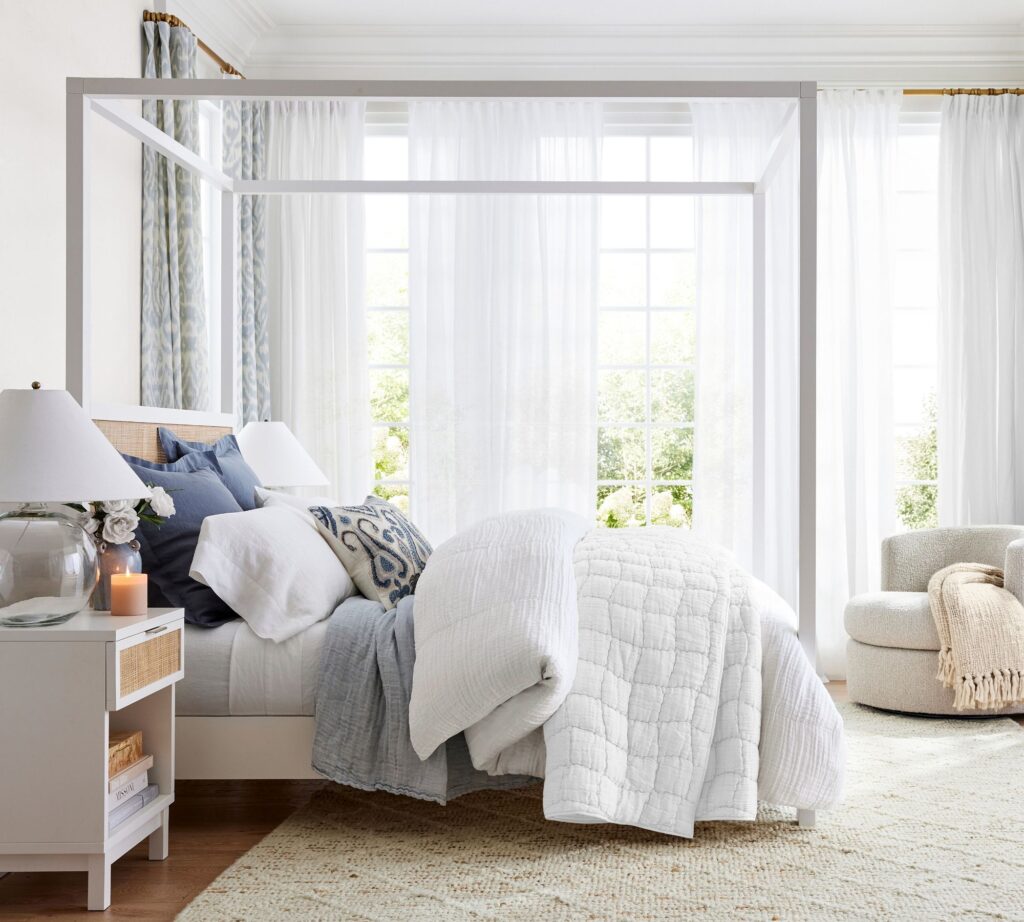 Pottery Barn bedroom with an ivory rug at the foot of the bed from our design updates guide.