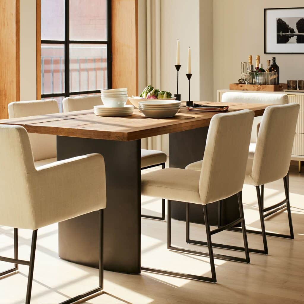 Wood dining table with 6 budget-friendly dining chairs from West Elm.