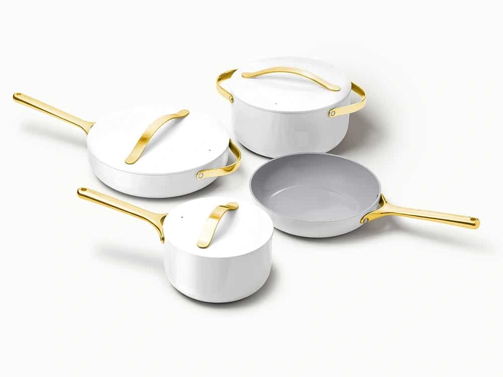 Caraway cookware set in white with gold handles from our affordable kitchenware guide.