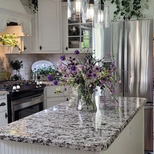 Vinyl kitchen countertop cover in white black granite from EZ Faux Decor.