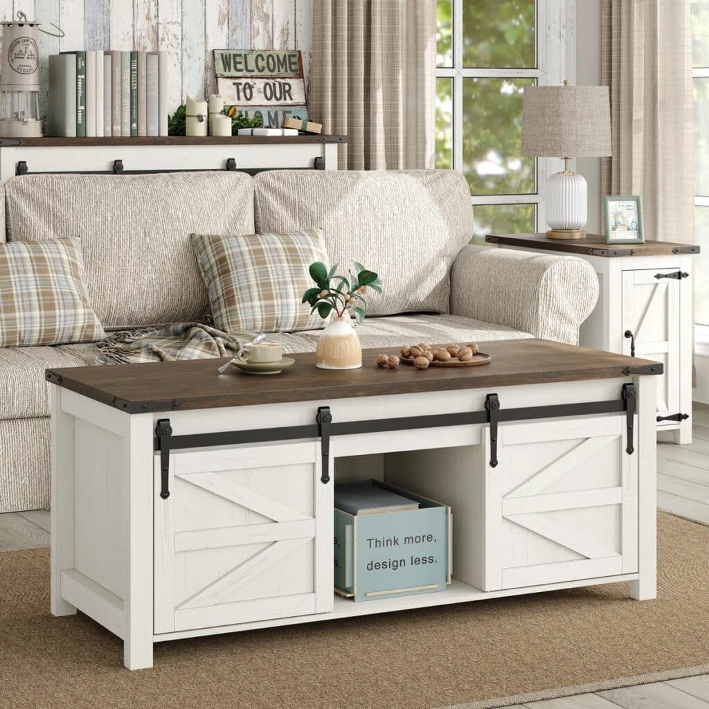 Lift-top farmhouse coffee table placed in front of a slipcovered sofa, showing practical function in a living room.