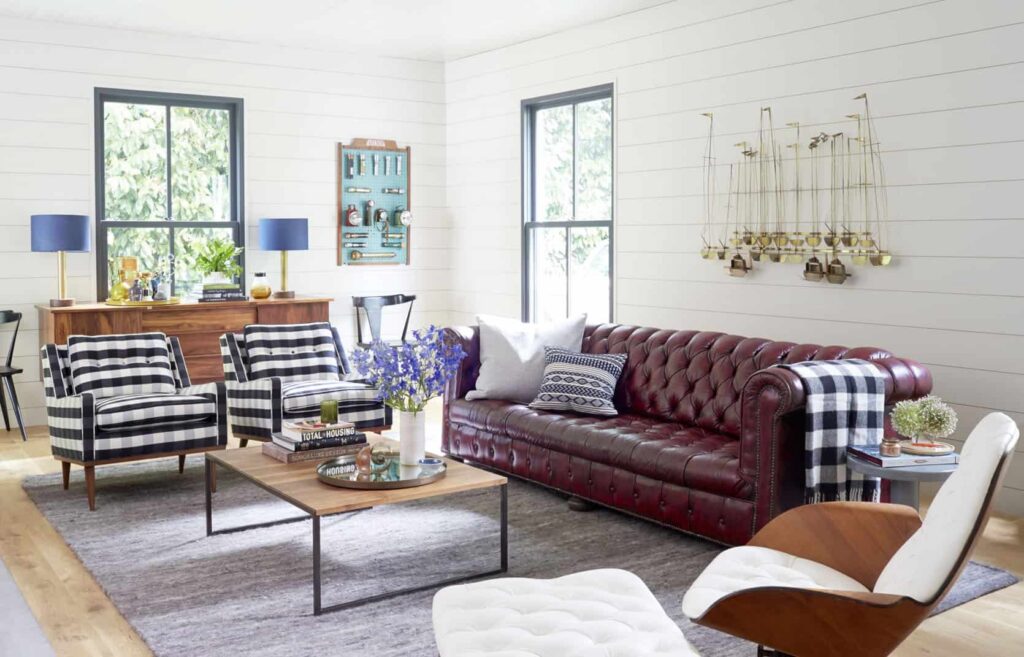 Living room with coordinated layout, layered lighting, and cohesive furniture arrangement.