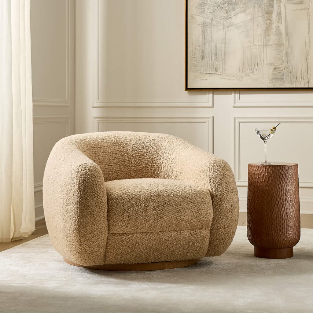 Boucle accent chair styled in a living room showing textured upholstery in a modern space.