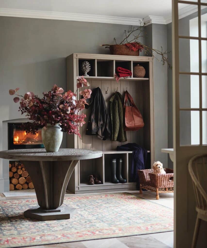 Entryway with visible clutter, creating a disorganized look.